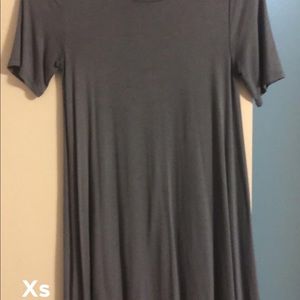 Short sleeve shirt. Longer in length.